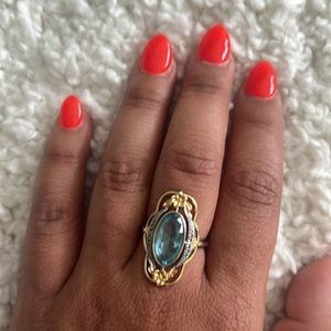 Ring size 9. Brand new. Silver and Gold.